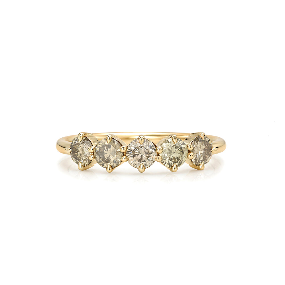 A yellow gold diamond band pinky ring featuring five round-cut diamonds set in a row, shown against a plain white background.