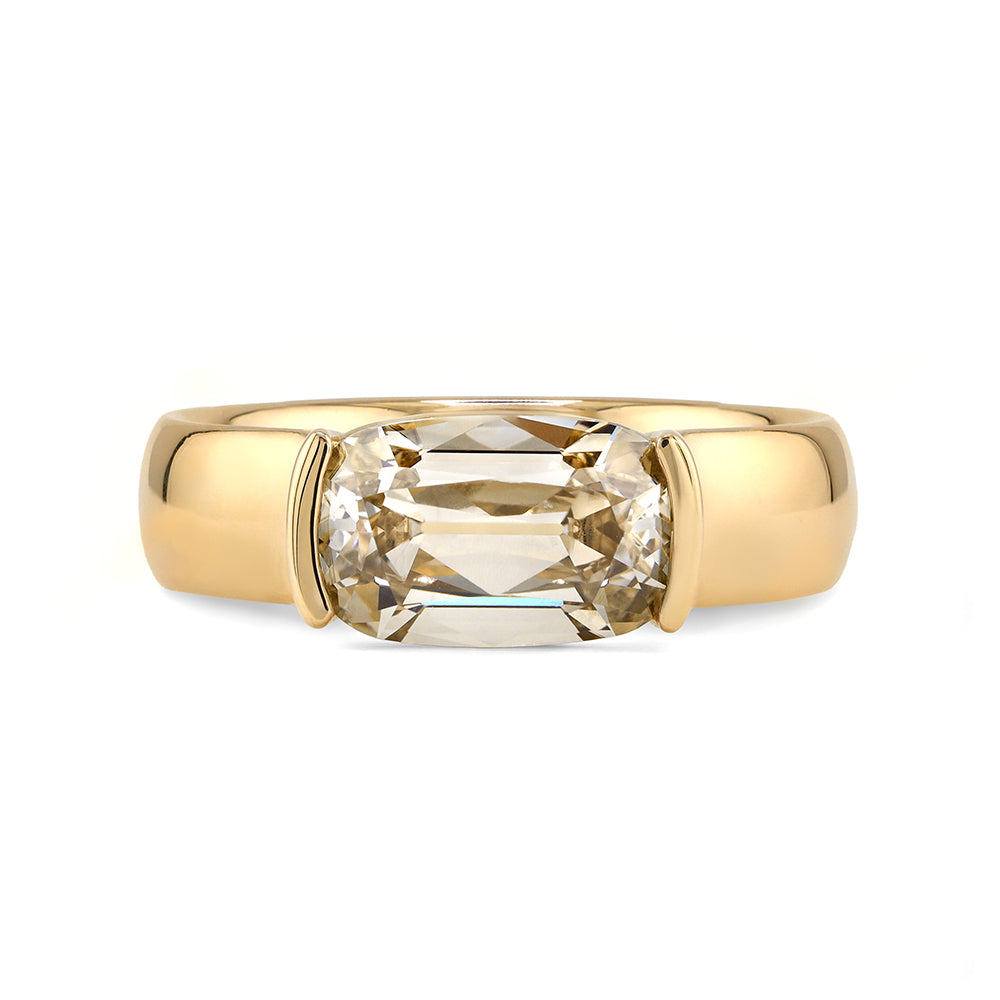 old mine cut elongated cushion champagne lab diamond ring set east west in a half bezel with a thick 14K yellow gold band 