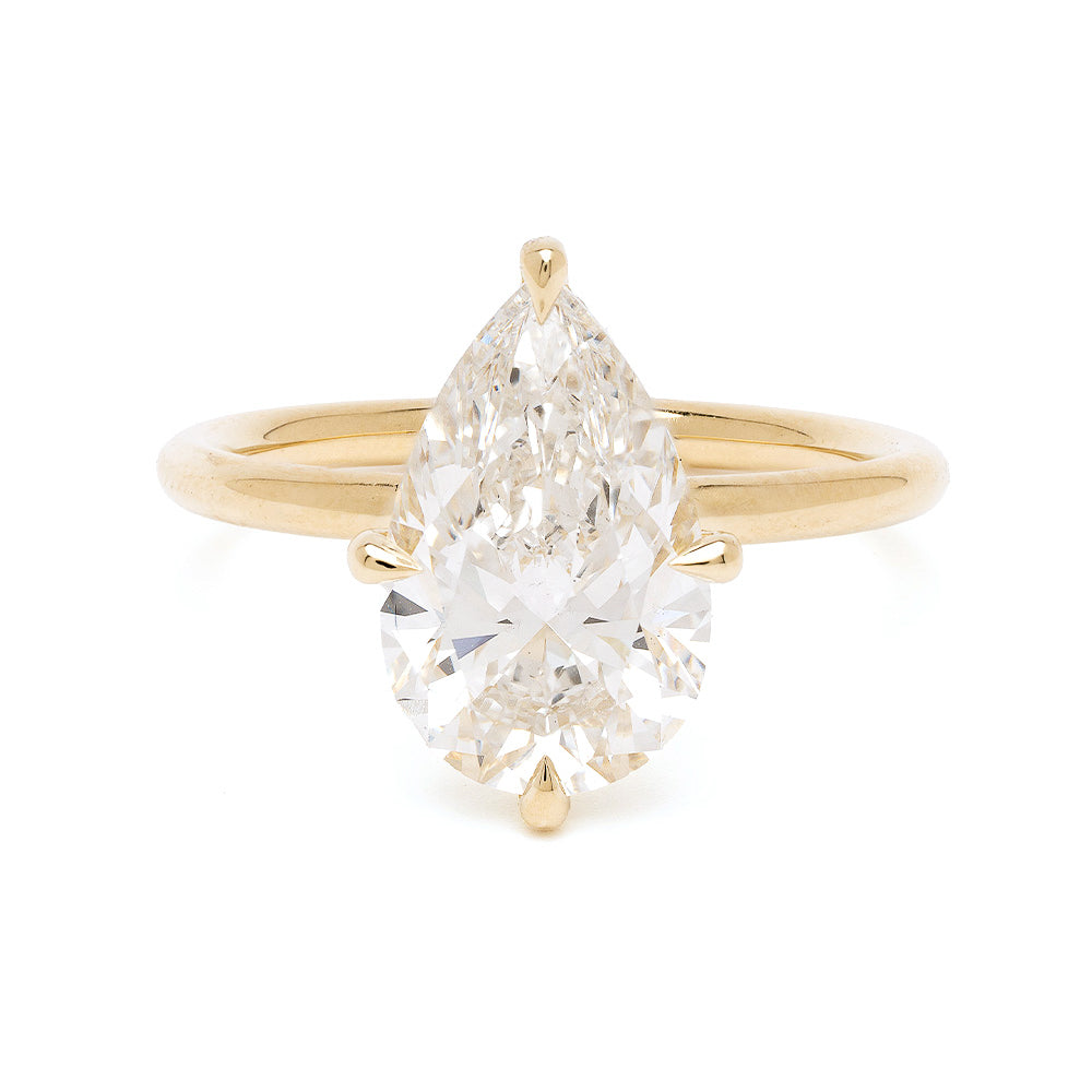 Modern Solitaire Pear Diamond Engagement Ring 1