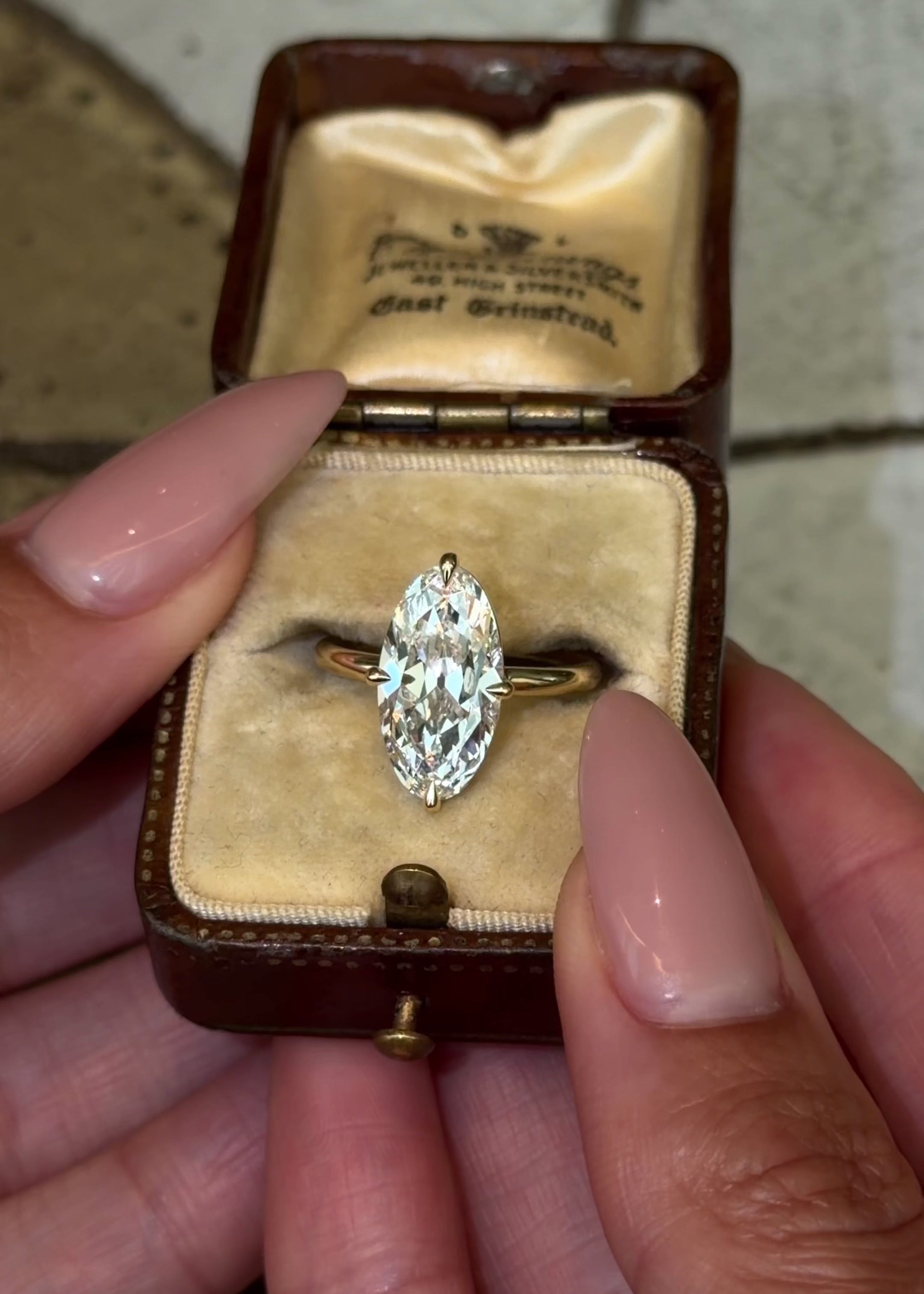 antique style cut moval lab grown diamond with compass prongs in 14k yellow gold