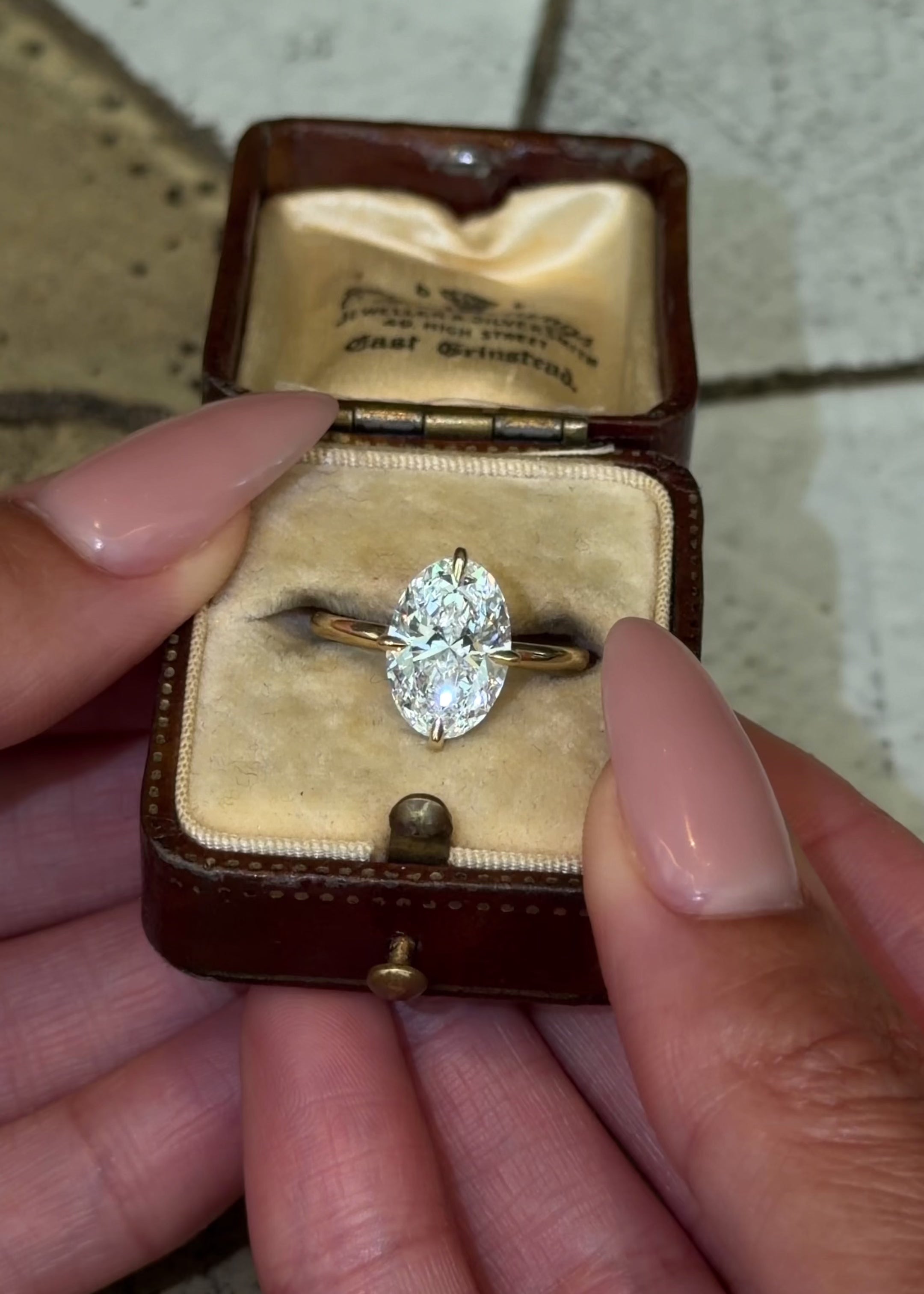 Lab Grown Oval diamond in a minimal compass prong setting in 4K yellow gold